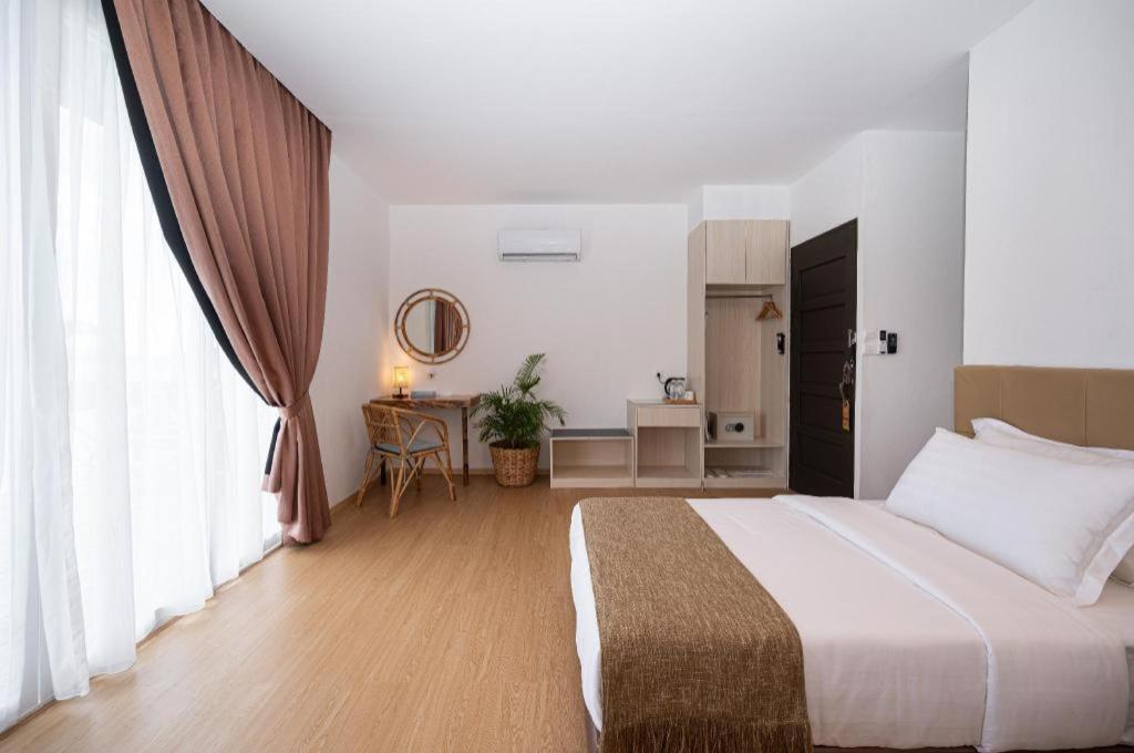 Sand Bay Resort เซมปอร์นา ภายนอก รูปภาพ